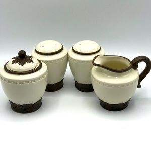 NWOT 4 pc. Set CBK porcelain sugar creamer salt pepper white and brown.